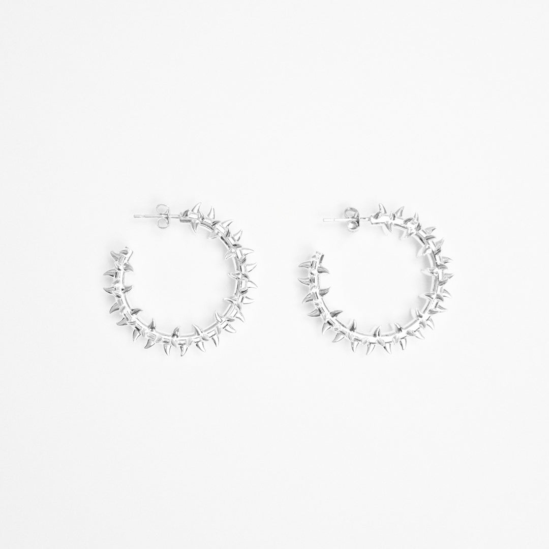 ARIDITY SILVER SPIKY LOOPS