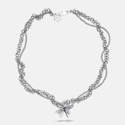 Silver tangled chain beaded necklace with flower pendant on a white background