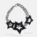 Black star beaded tatoo necklace on a white background