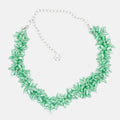 A statement acid green futuristic botanical necklace with mat mint beads, product viewed from the front