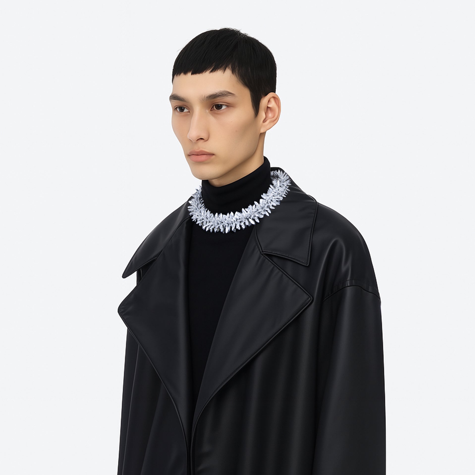 model wearing a multi beaded silver floral statement necklace on a white background