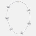 Silver necklace with floral beaded pendants on a white background