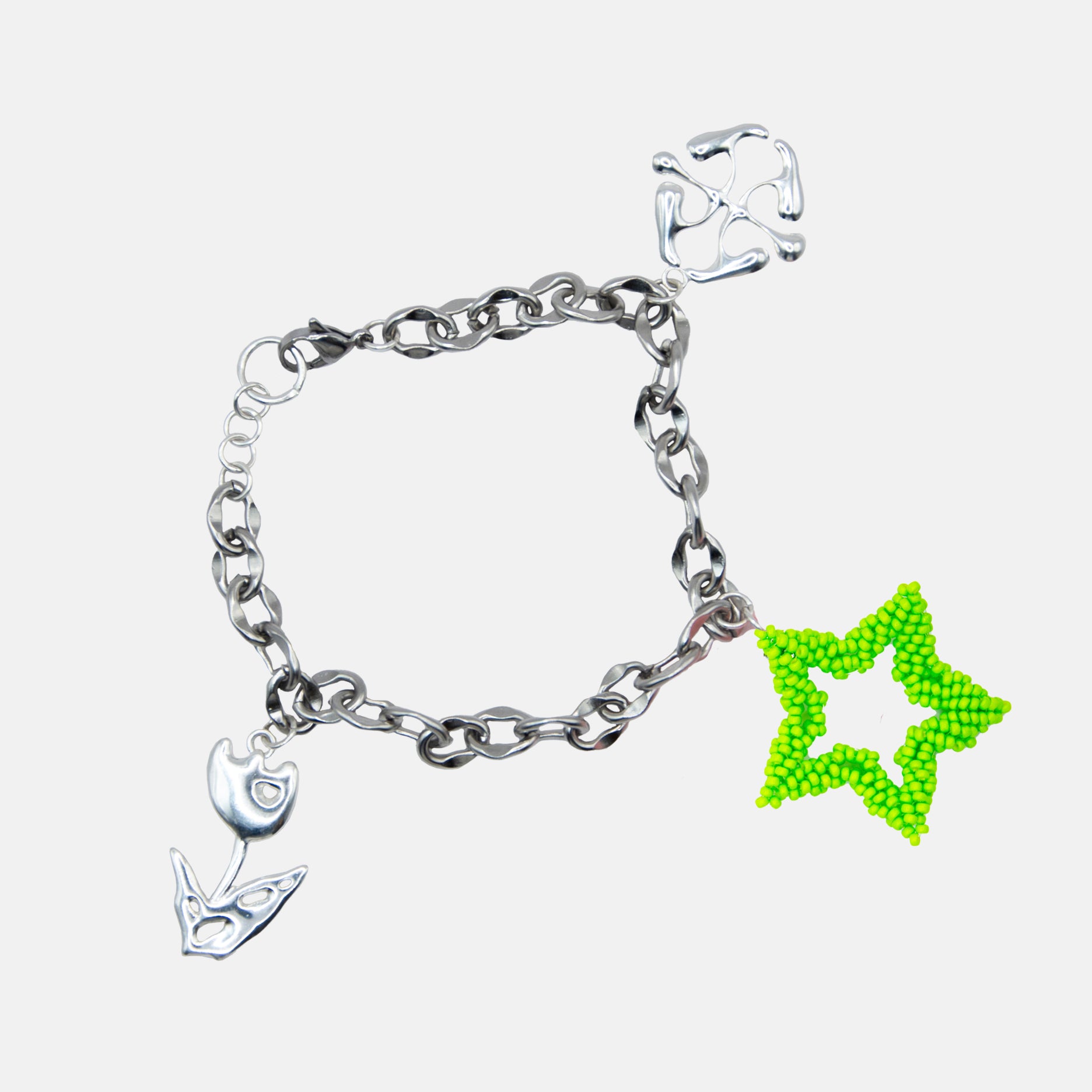 green star silver bracelet with charms on a white background