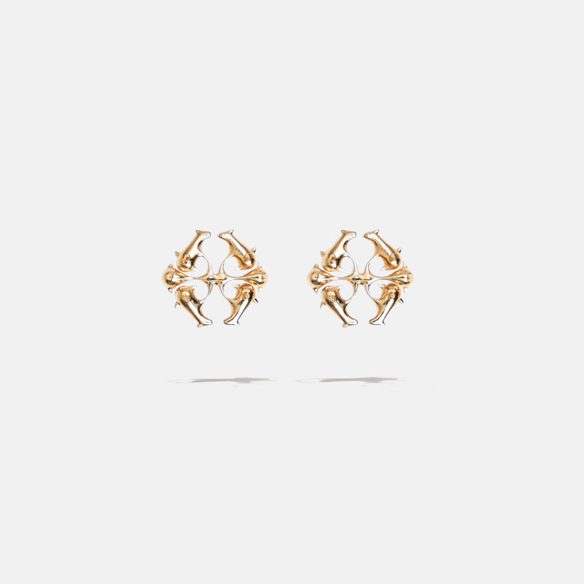A gold coloured brass pair of logo stud fantasy earrings with floral inspired spikes, product viewed from the front