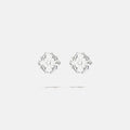 A brass silver colored pair of logo stud fantasy earrings with floral inspired spikes, product viewed from the front