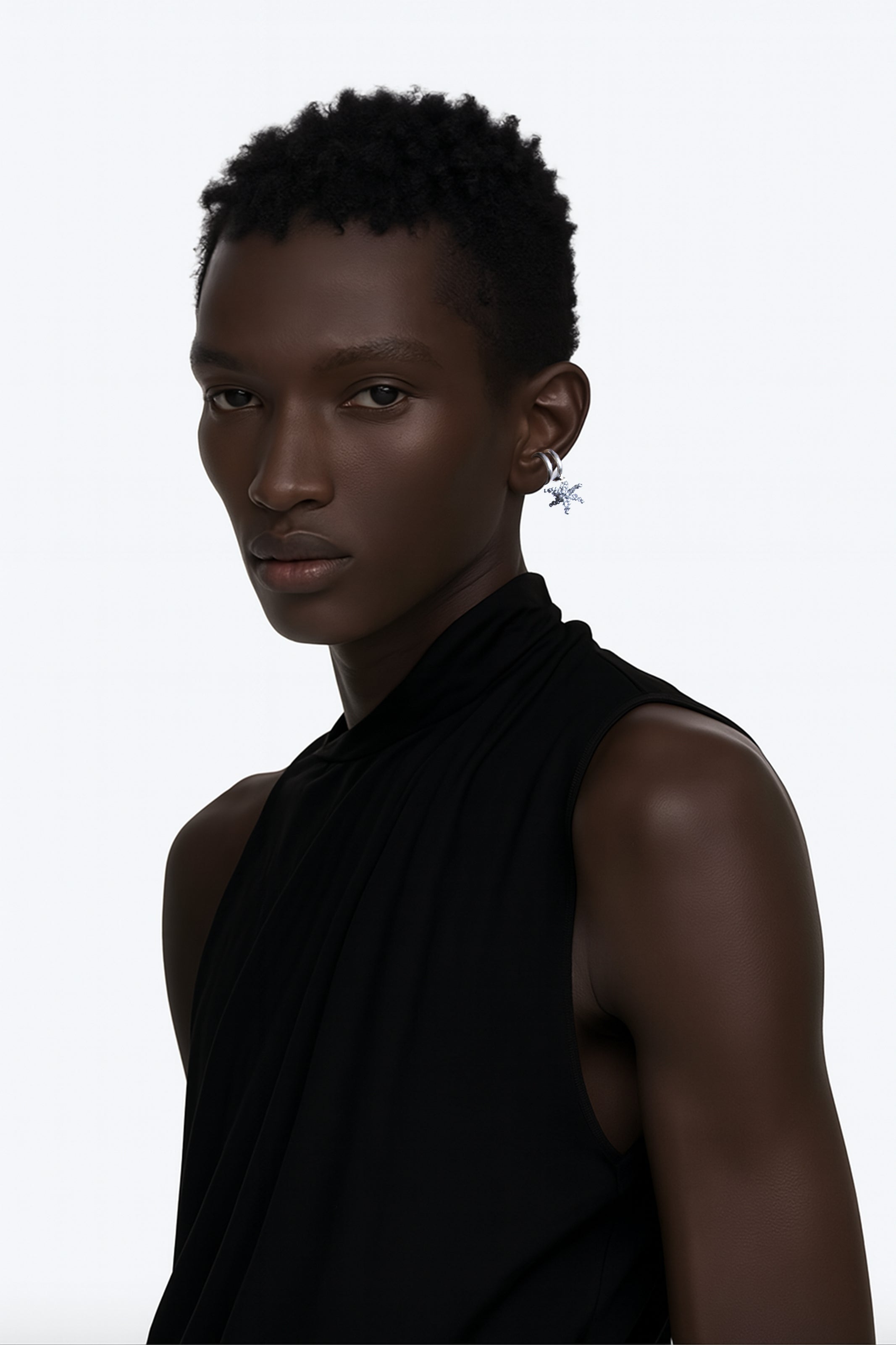 A brass silver set of earcuffs with silver beaded flower fantasy earring worn by an AI model with sleeveless black jumper view from 3/4